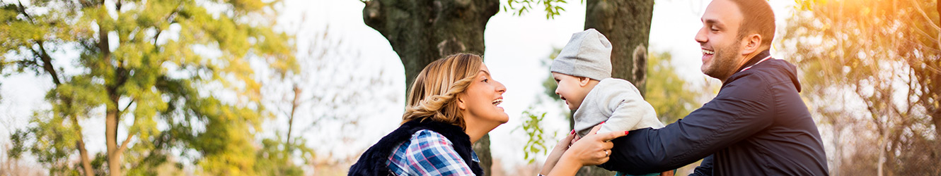 Family playing in a park