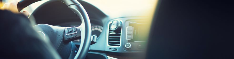 Young man driving his car