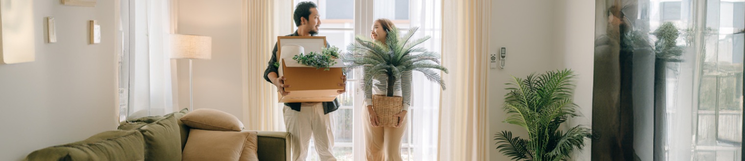 a couple moving into their new place