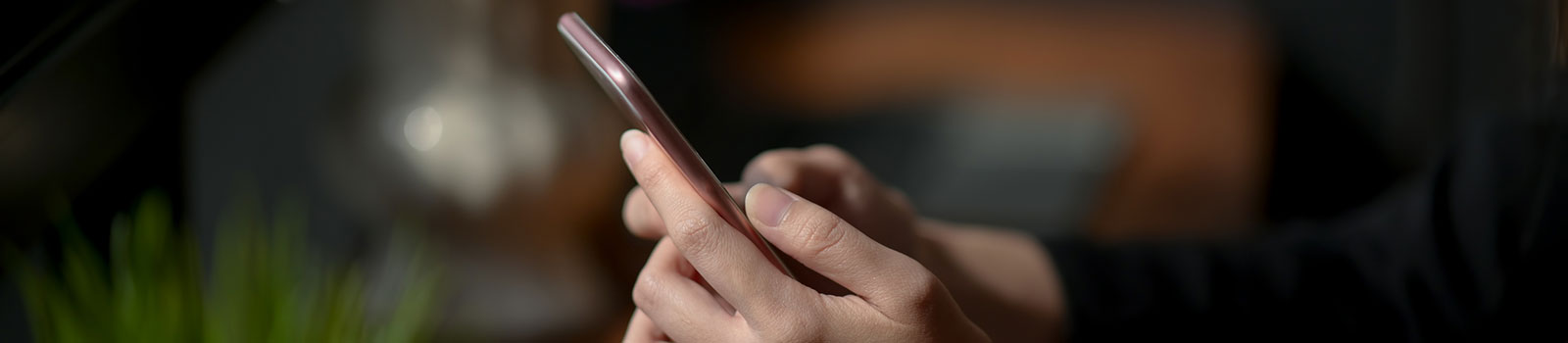 Close up of person using cell phone